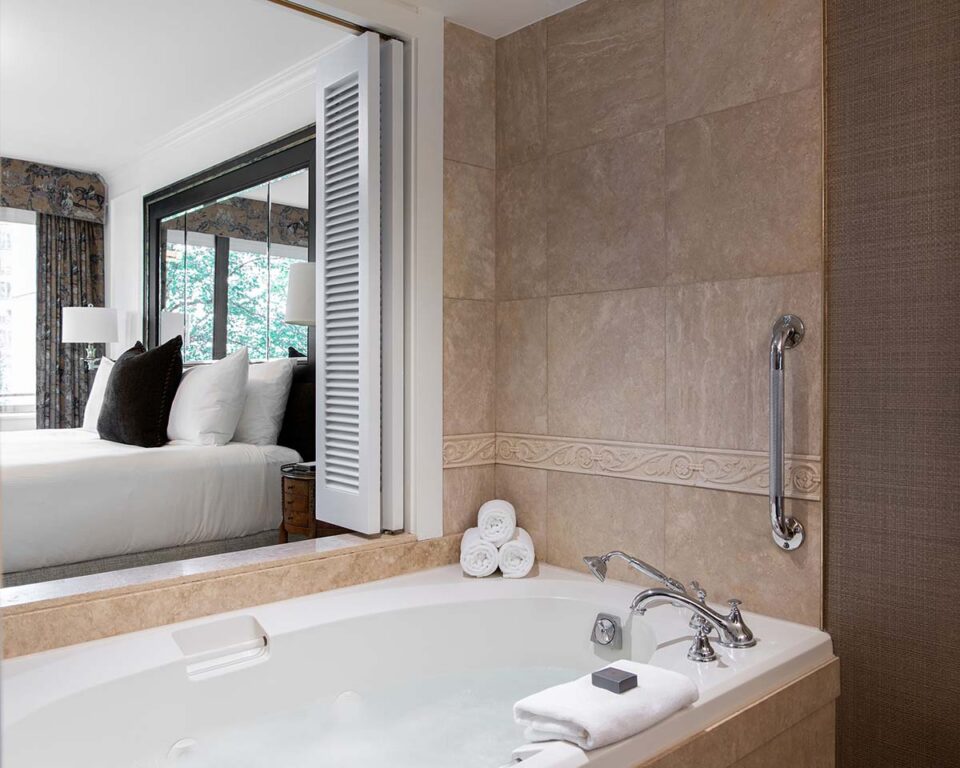 Deluxe Suite with a King Bed, featuring Brown Equestrian Accents