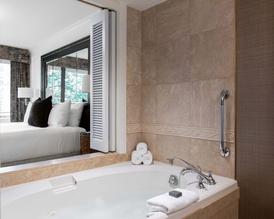Deluxe Suite with a King Bed, featuring Brown Equestrian Accents